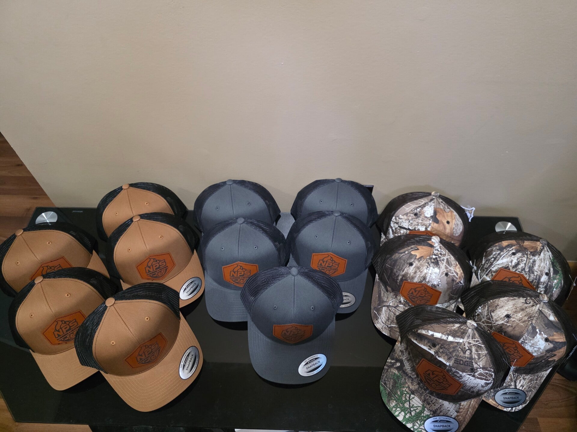 Custom engraving — hats, drinkware, and signage from the Weyburn shop